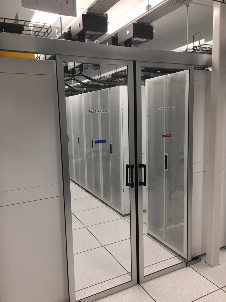 sliding access door in a contained aisle